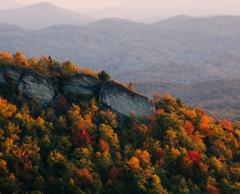 wes-hicks-Ag6m0LZNwnE-unsplash Senior citizens laughing on a dock