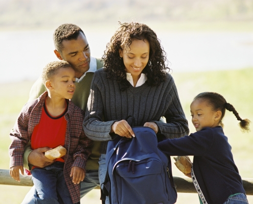 Senior citizens laughing on a dock