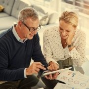 Two people reviewing financial planning
