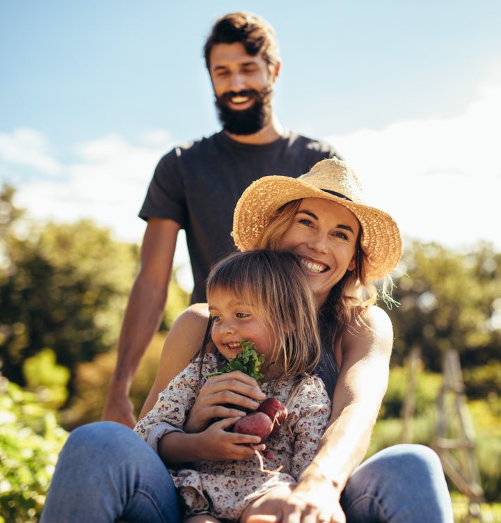 Young family enjoying a garden