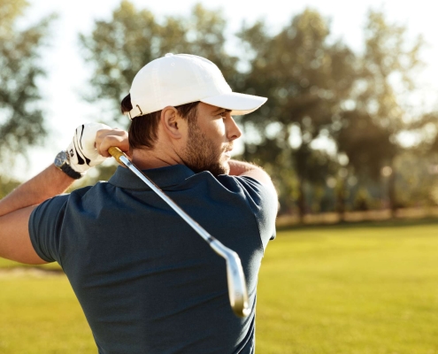 Man playing golf