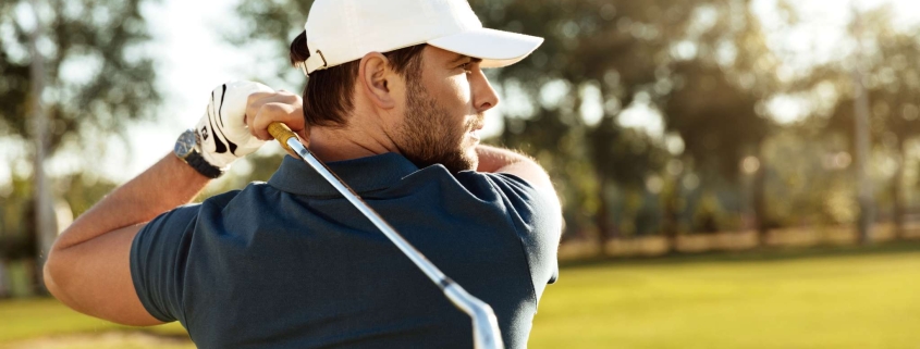 Man playing golf