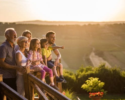 istockphoto-1129106185-612x612 Senior citizens laughing on a dock