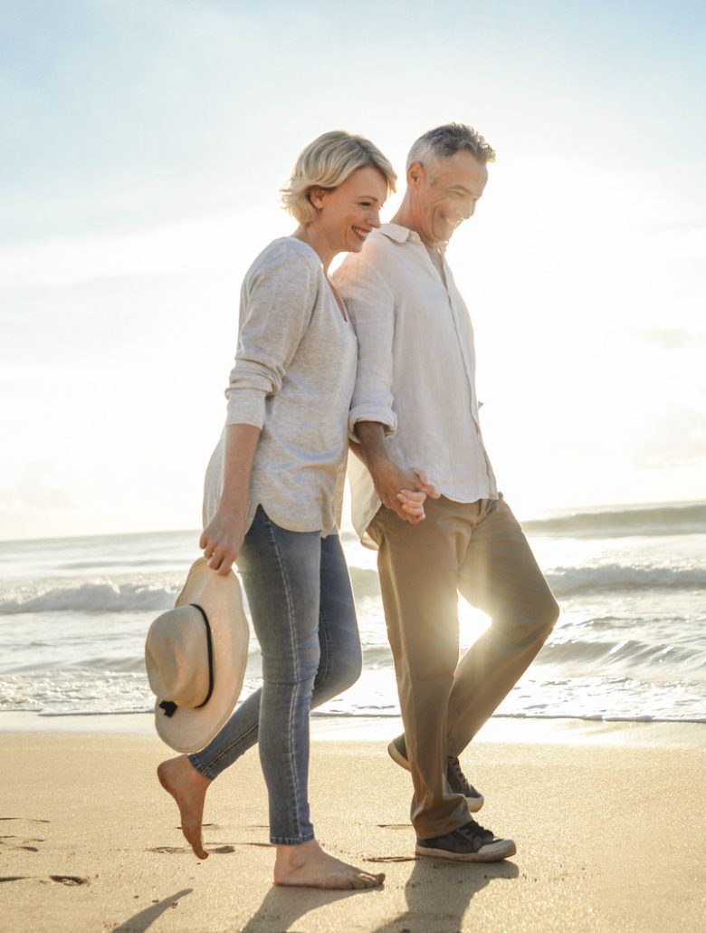 Couple walking on the beach